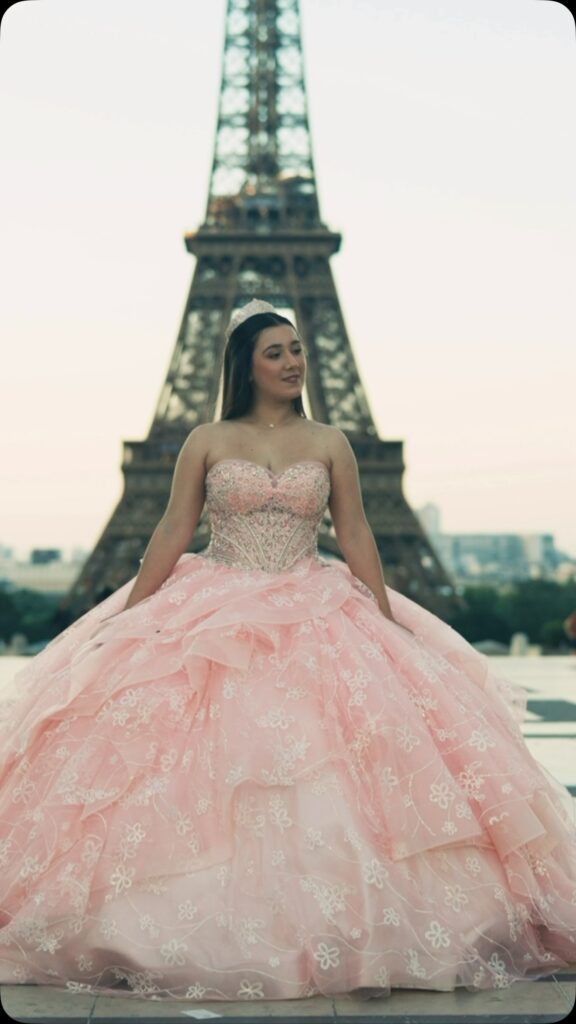 Blush pink floral tiered quinceañera ball gown available to rent in Orlando, FL