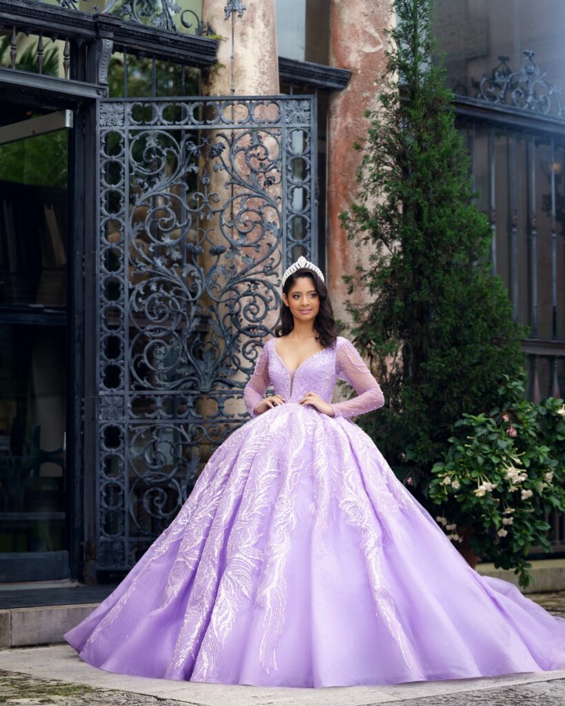 Purple long-sleeve quinceañera dress available to rent in Orlando, FL
