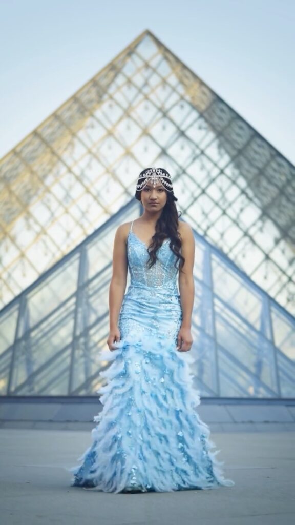 Light blue feather gown available to rent in Orlando, FL