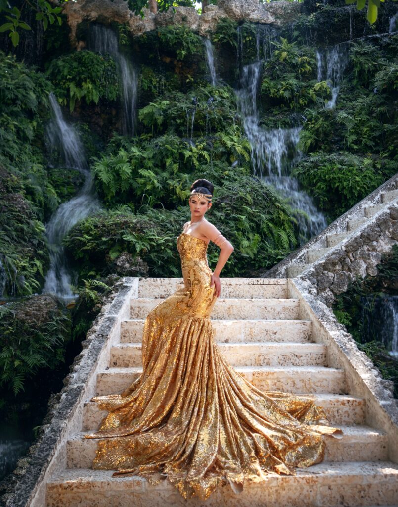 Gold mermaid quinceañera gown with long train, for rent in Orlando