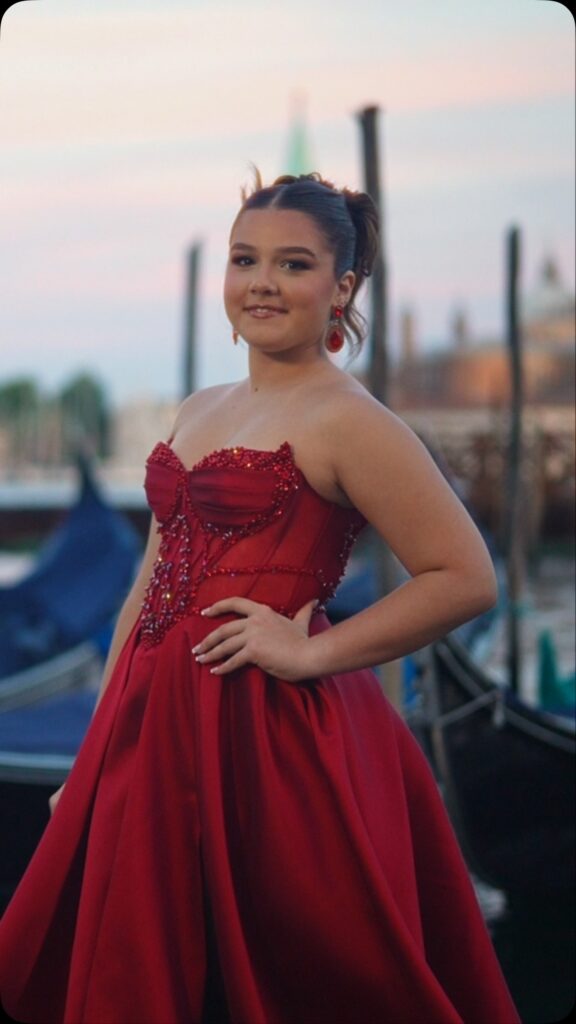 Red beaded corset A-line quinceañera gown available to rent in Orlando, FL