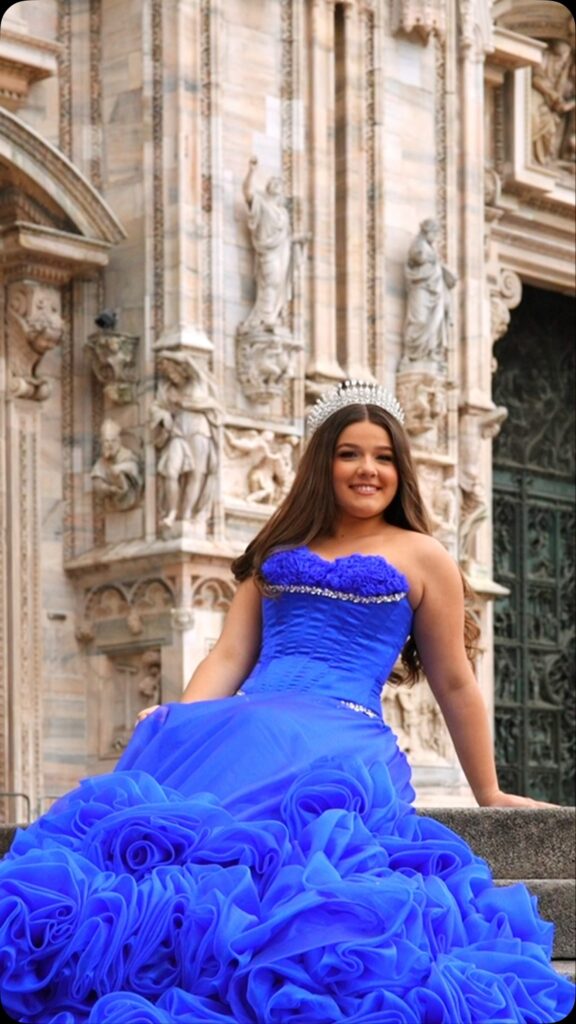 Royal blue ruffle rose quinceañera ball gown available to rent in Orlando, FL