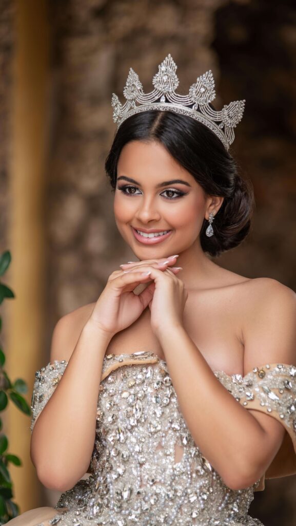 Silver crystal quinceañera tiara and sequin gown available to rent in Orlando, FL