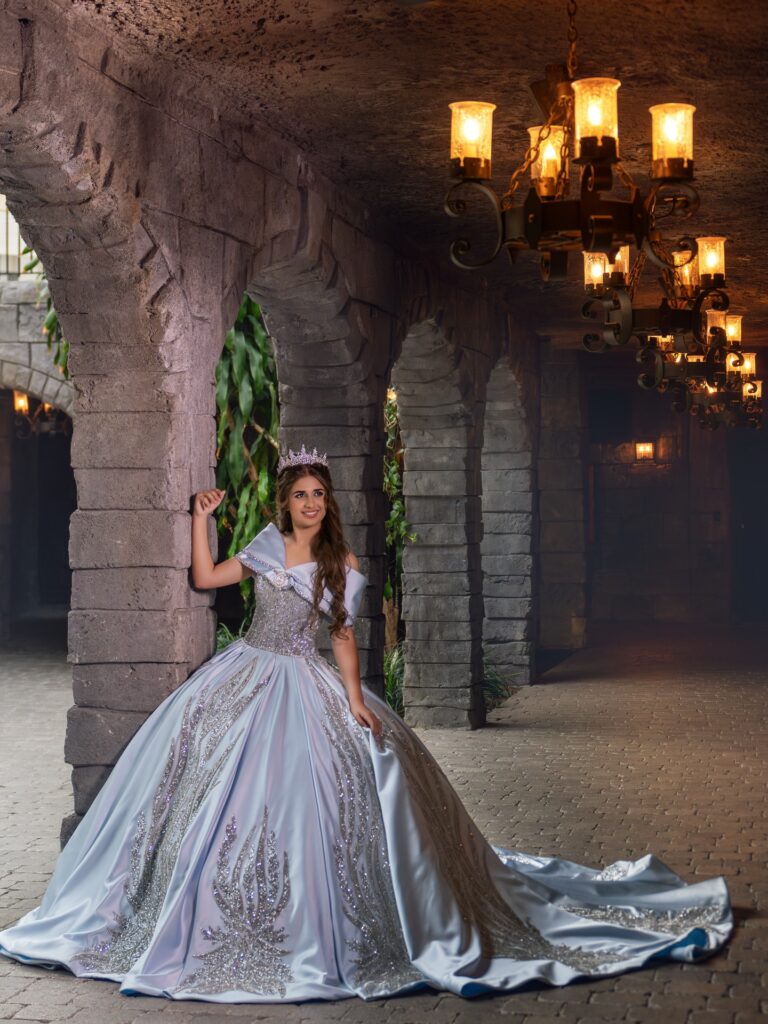 Silver satin quinceañera dress available to rent in Orlando, FL